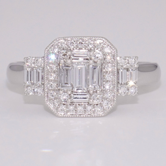 Platinum baguette cut and round brilliant cut diamond cluster ring