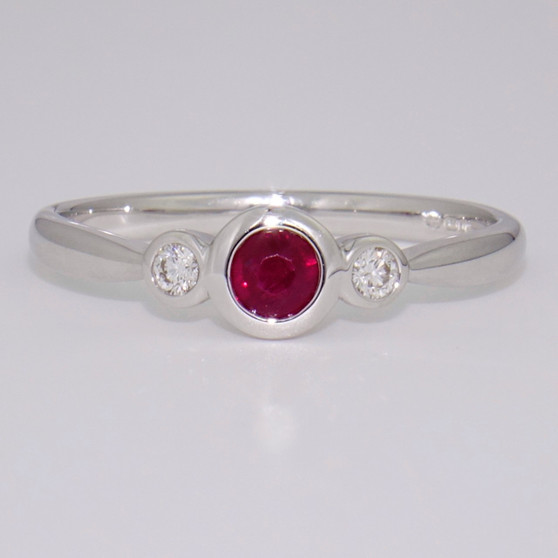 9ct white gold ruby and diamond three stone rubover ring