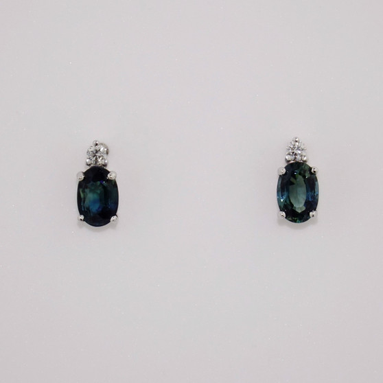 18ct white gold oval cut teal sapphire and round brilliant cut diamond stud earrings