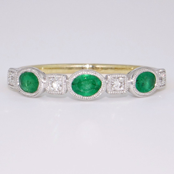 9ct gold emerald and diamond ring with a milgrain edge