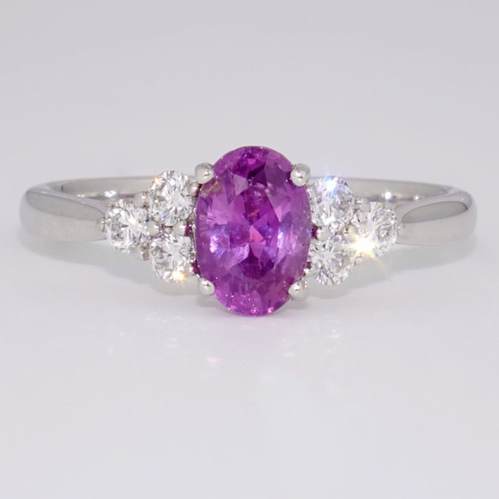 Platinum unheated oval cut pinkish purple sapphire and diamond ring