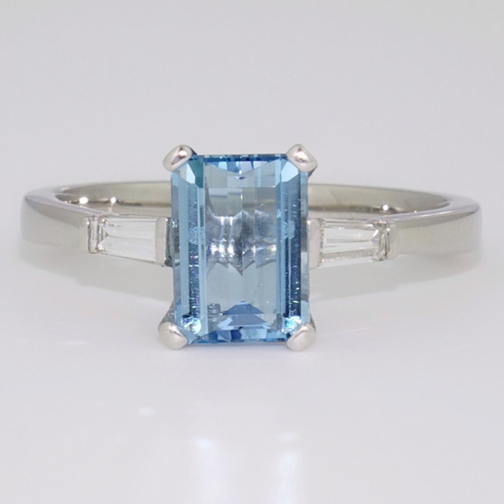 Platinum emerald cut aquamarine and tapered baguette cut diamond ring