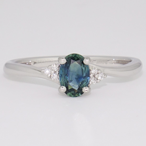 Platinum teal sapphire and diamond twist ring