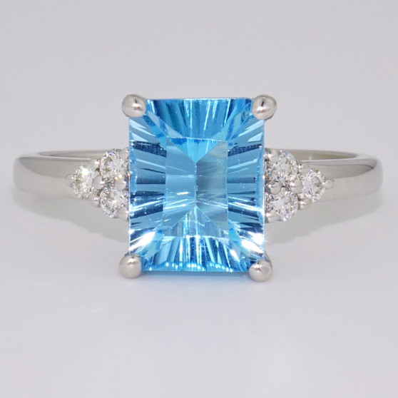 Unique 9ct white gold laser cut blue topaz and diamond ring