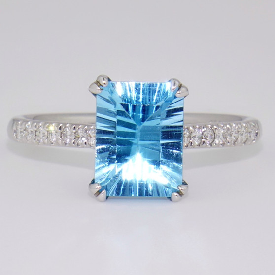 Unique 9ct white gold laser cut blue topaz and diamond ring