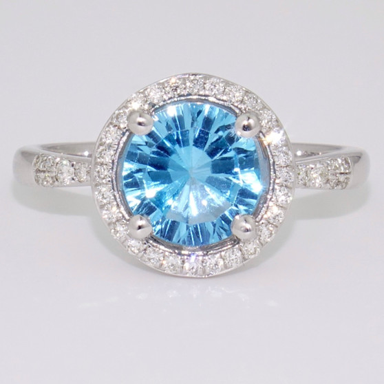 9ct white gold laser cut blue topaz and diamond ring