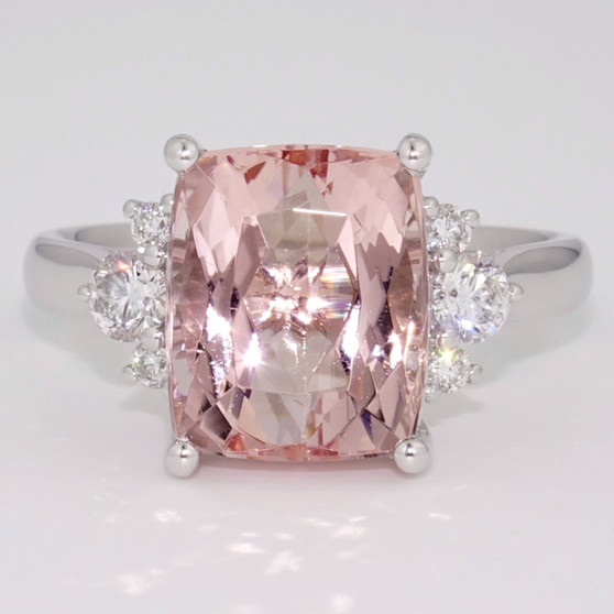 Platinum rectangular cushion cut morganite and graduated round brilliant cut diamond ring