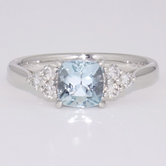 Platinum cushion cut Brazilian aquamarine and six round brilliant cut diamond ring