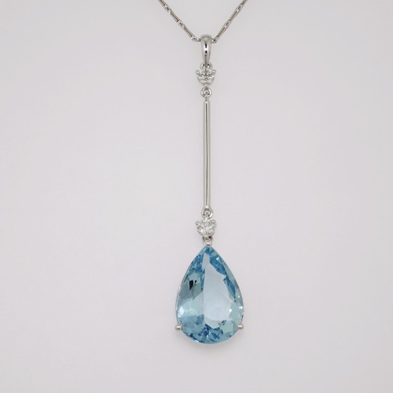Unique 9ct white gold pear cut fine blue aquamarine and round brilliant cut diamond bar pendant