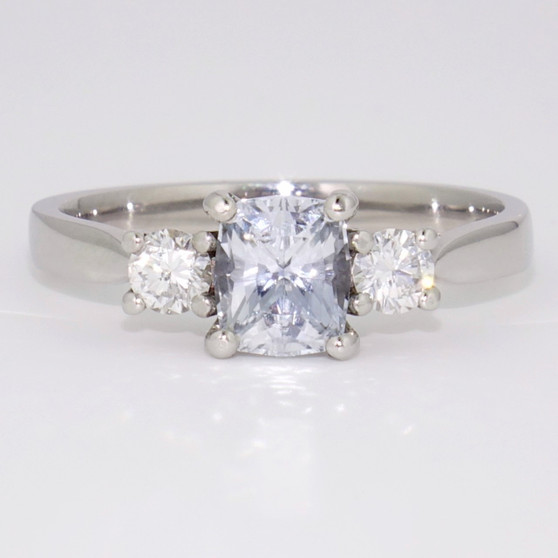 Platinum unheated Sri Lankan cushion cut sapphire and round brilliant cut diamond ring
