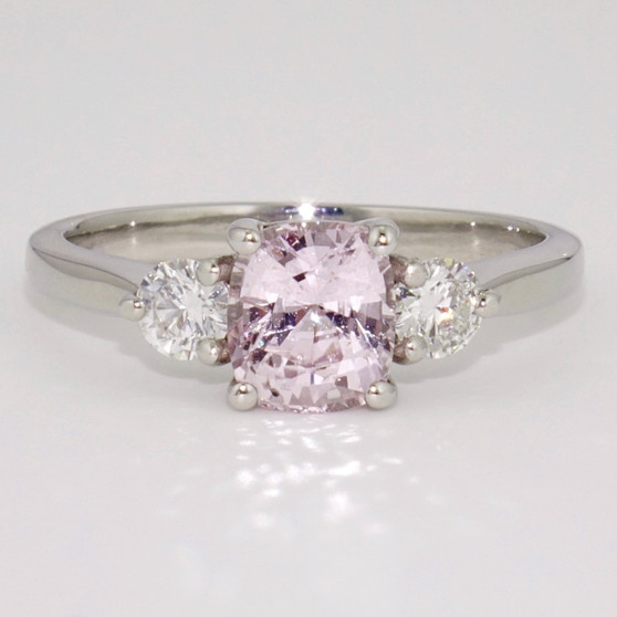 Platinum unheated cushion cut pastel pink sapphire and round brilliant cut diamond ring