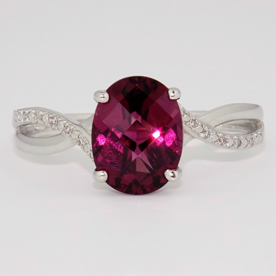 9ct white gold oval cut raspberry garnet and diamond ring 9ct white gold oval cut raspberry garnet and diamond ring