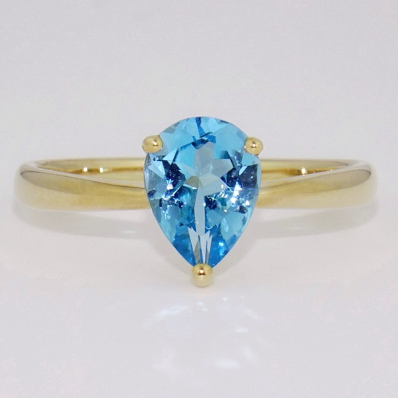 9ct gold pear cut blue topaz ring