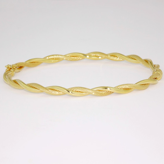 9ct gold twisted hinged oval bangle