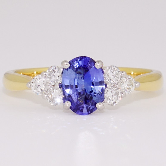 18ct gold and platinum oval cut Ceylon sapphire and round brilliant cut diamond ring