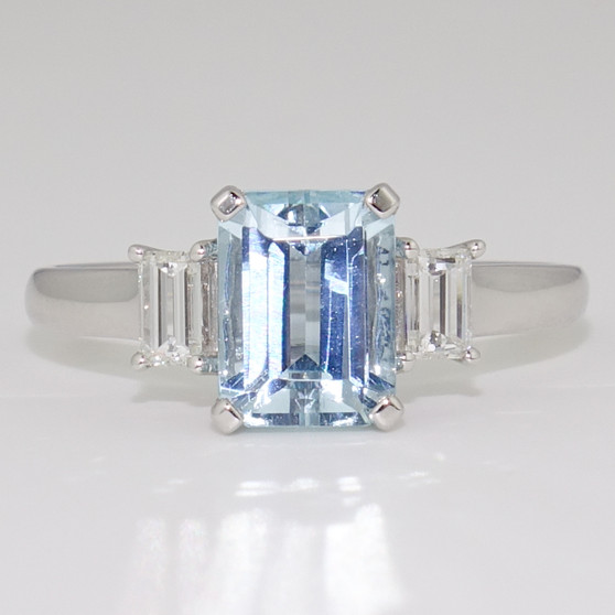 Platinum emerald cut aquamarine and baguette cut diamond ring