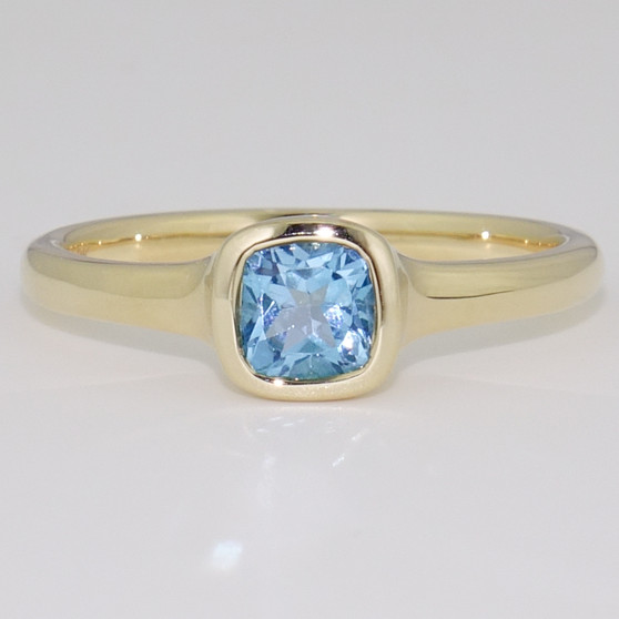 9ct gold cushion cut blue topaz rubover ring 9ct gold cushion cut blue topaz rubover ring