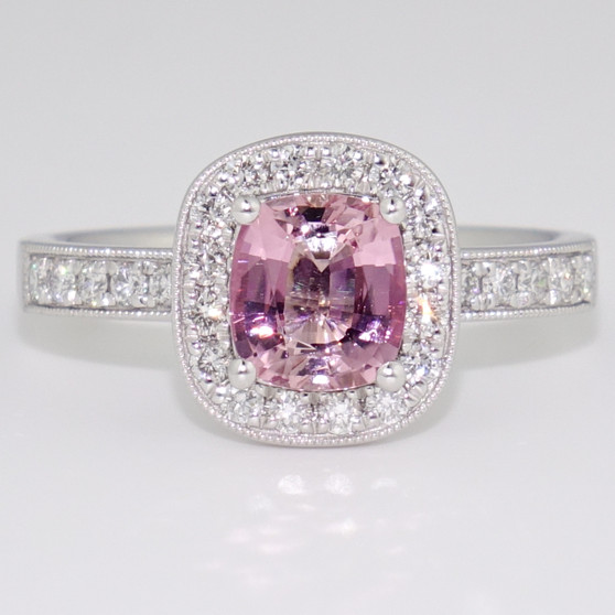 Platinum unheated pink cushion cut tanzanite and diamond halo ring with diamond-set shoulders