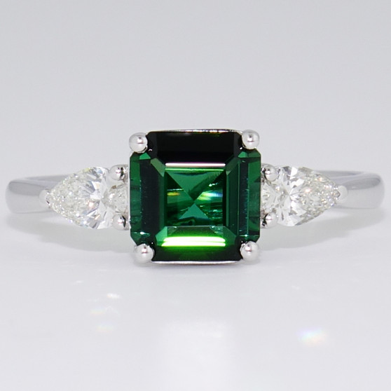 Platinum octagonal cut green tourmaline and pear cut diamond ring Platinum octagonal cut green tourmaline and pear cut diamond ring