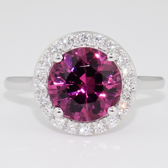 Platinum round cut malaya garnet and diamond halo ring