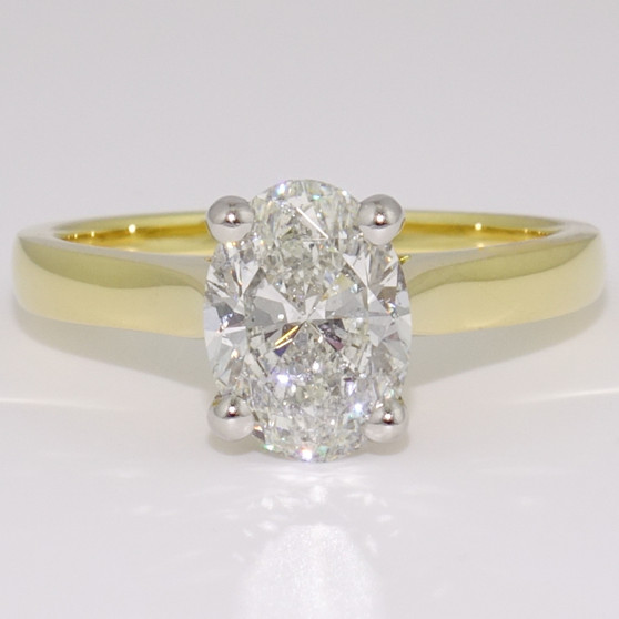 18ct gold and platinum oval diamond solitaire ring