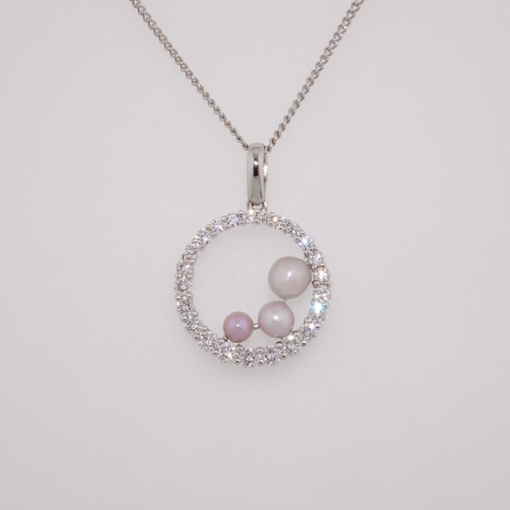18ct white gold Scottish freshwater pearl and diamond-set circle pendant