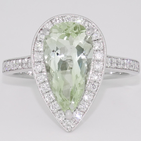 18ct white gold unheated pear cut green aquamarine and diamond halo ring with diamond-set shoulders
