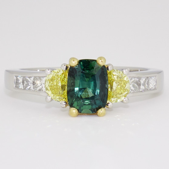 Platinum and 18ct gold teal sapphire and diamond ring