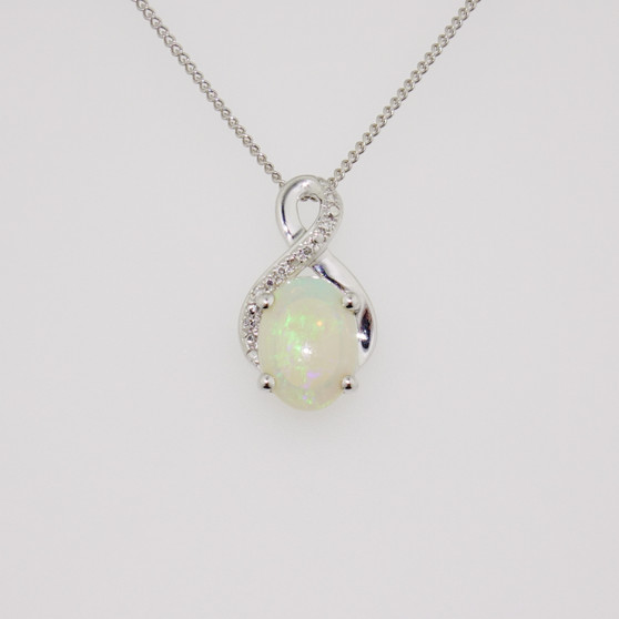 9ct white gold opal and diamond twist pendant