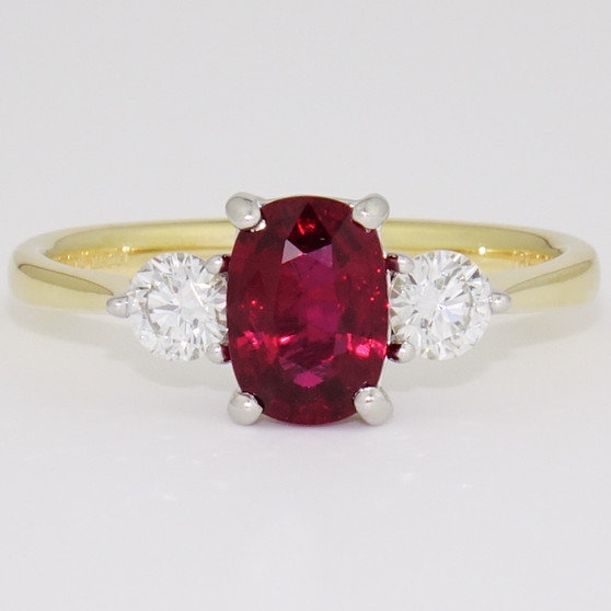 18ct gold and platinum unheated cushion cut ruby and round brilliant cut diamond ring