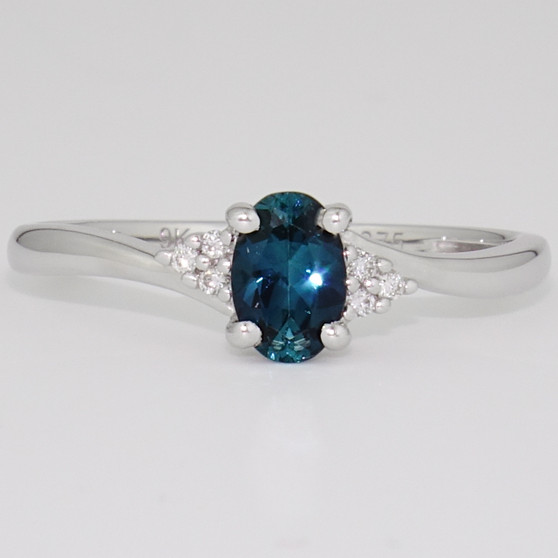 9ct white gold oval cut indicolite tourmaline and diamond twist ring