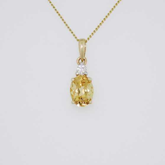 9ct gold Imperial topaz and diamond pendant