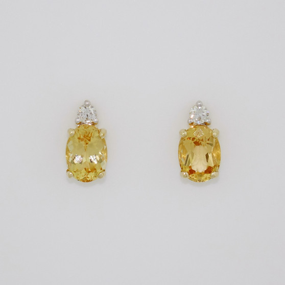 9ct gold oval cut Imperial topaz and round brilliant cut diamond stud earrings
