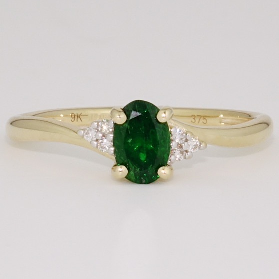 9ct gold oval cut tsavorite garnet and diamond twist ring