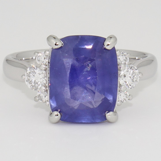 Platinum rectangular cushion cut Ceylon sapphire and round brilliant cut diamond ring