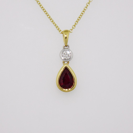 18ct yellow and white gold pear cut ruby and round brilliant cut diamond pendant