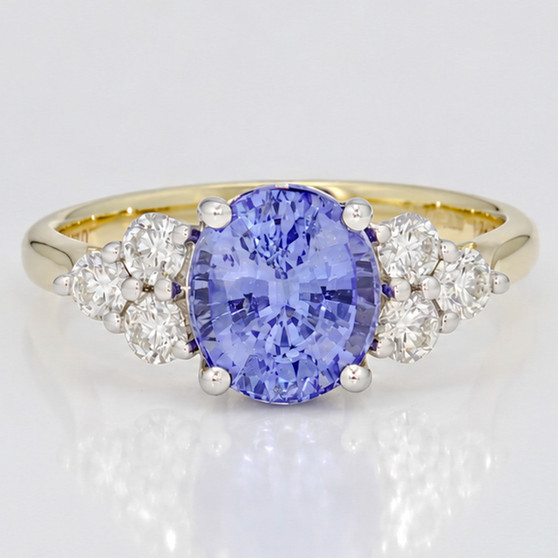 18ct gold and platinum oval cut Ceylon sapphire and round brilliant cut diamond ring