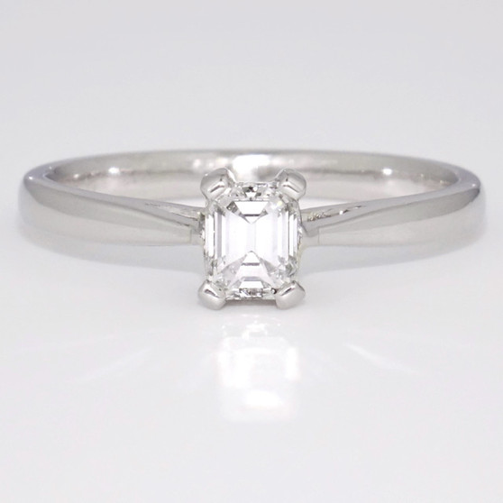 Platinum emerald cut diamond ring