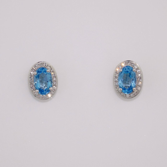 9ct white gold oval cut blue topaz and diamond cluster stud earrings
