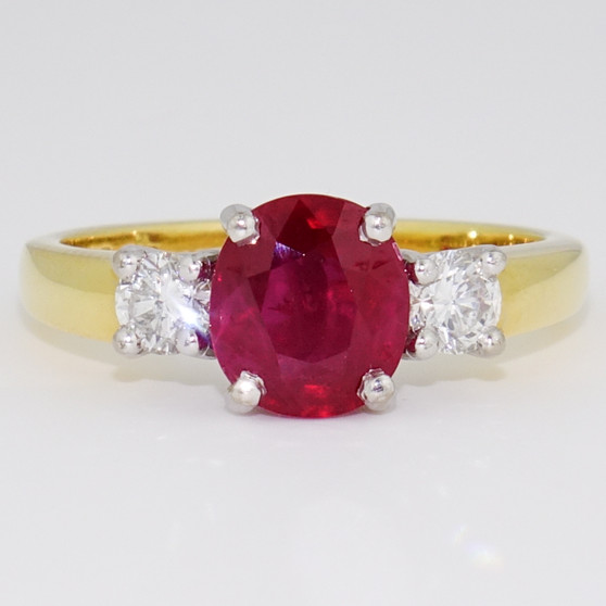 18ct gold oval cut ruby and diamond ring
