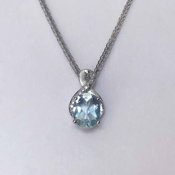 9ct white gold aquamarine and diamond pendant