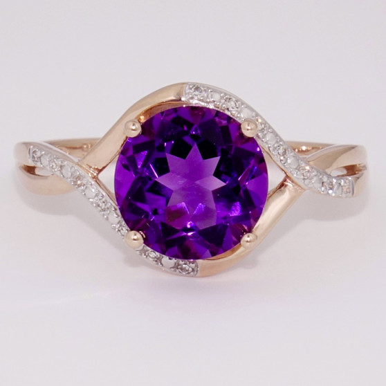 9ct rose gold amethyst and diamond ring.