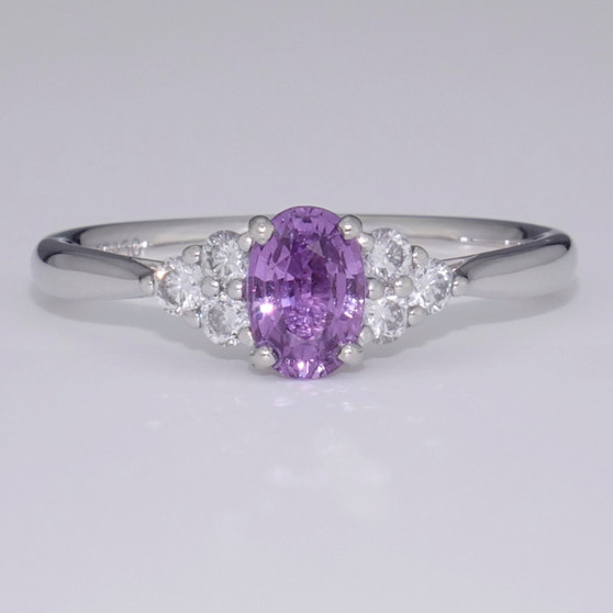Platinum purple sapphire and diamond ring