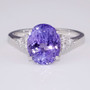 18ct white gold oval cut tanzanite and round brilliant cut diamond ring