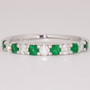 Platinum emerald and diamond ring