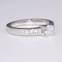 Platinum diamond solitaire ring with diamond-set shoulders GR3134 side
