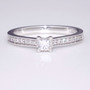 Platinum princess cut diamond solitaire ring with diamond-set shoulders GR3919