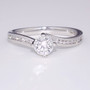 18ct white gold diamond solitaire twist ring with channel-set diamond shoulders GR3751