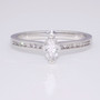 Platinum diamond solitaire ring with diamond-set shoulders GR3944