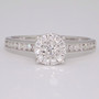 9ct white gold diamond cluster ring with diamond-set shoulders